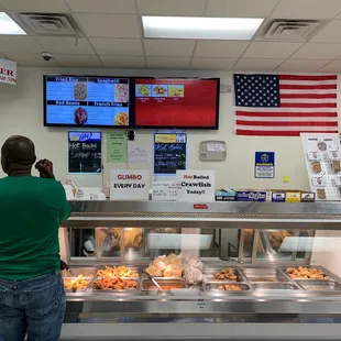 a man standing in front of the counter
