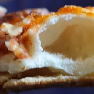 More bubbles! Also, the different layers of crust are visible - crispy thin bottom layer, then soft, doughy inside (sorry so blurry)