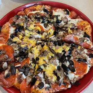 Small Pizza w/Salami, Sausage, Mushroom, Olives, and Cheese