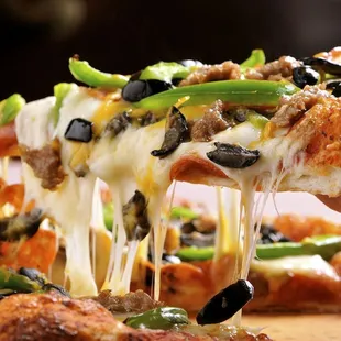 Our crust is unique!  No sagging, lots of toppings.