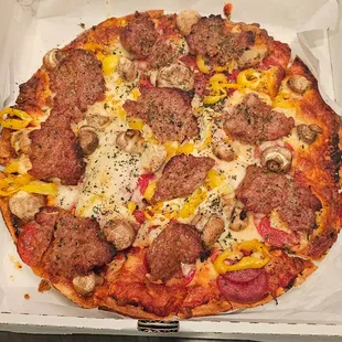 a pizza in a pizza box