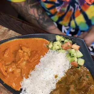 a plate of curry and rice