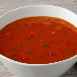 Tomato Basil Soup, cooked tomatoes and tomato juice pureed with fresh basil leaves, available for lunch!