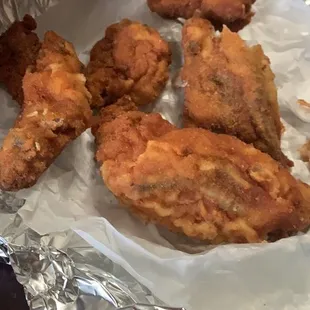 fried chicken wings in foil