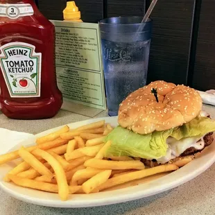 1/2 lb Village Burger. Bacon and mozzarella cheese