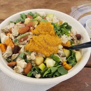 Farmer's Daughter bowl - chicken, almonds, apples, sweet potato over kale and spinach with balsamic dijon and roasted carrot vinaigrette