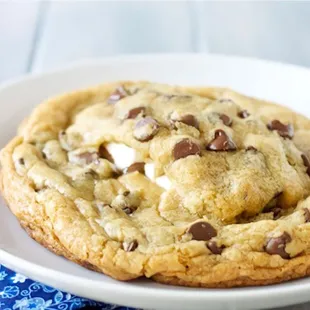 a chocolate chip cookie on a plate