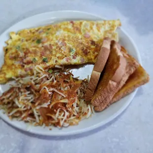 Western omelet, hash browns, wheat toast.