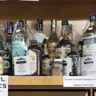 a shelf of liquor bottles