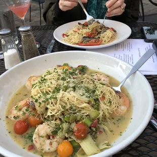 a plate of pasta and shrimp