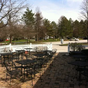 patio area with tables and chairs