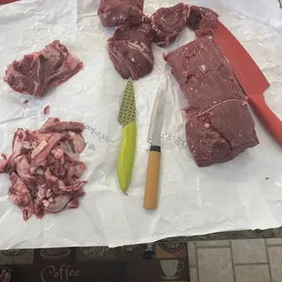 a variety of raw meat