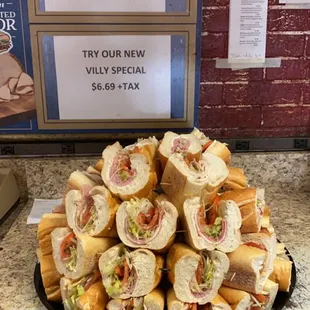 a platter of sandwiches on a counter