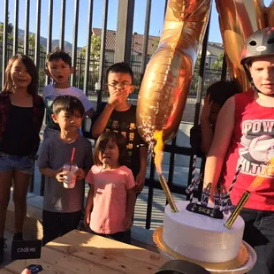 The awesome candles and the kids expressions LOL!