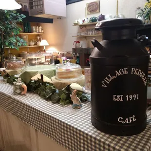 a table with a large jug on it