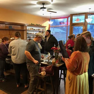 a large group of people in a restaurant
