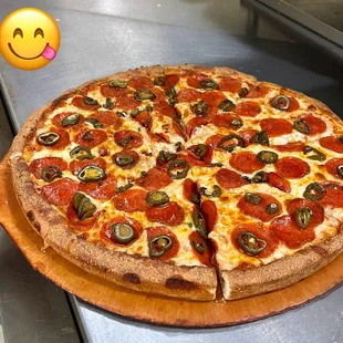 pepperoni, olives, and cheese pizza