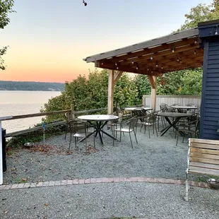 Outdoor seating at dusk in fall.