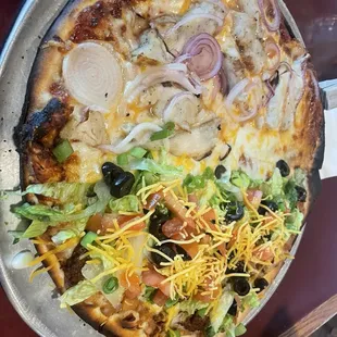 Bbq chicken pizza and half taco pizza