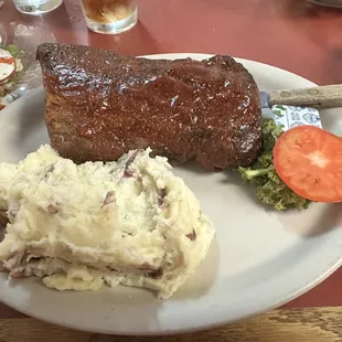 Half rack of ribs and garlic mashed potatoes