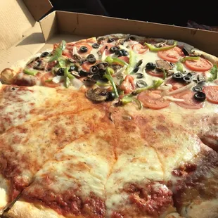 Half plain/half veggie pizza