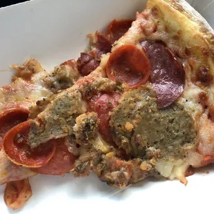 two slices of pepperoni pizza