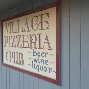 a sign on the side of a building