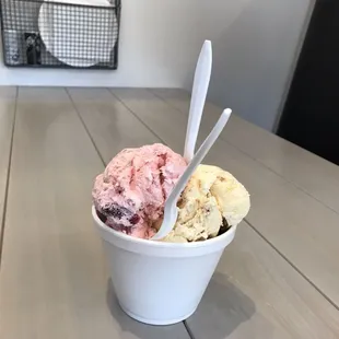 a cup of ice cream on a table
