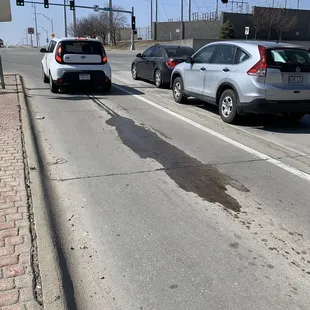 New oil on the road where I was sitting waiting for the green turn signal.