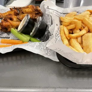 Breaded wings and fries