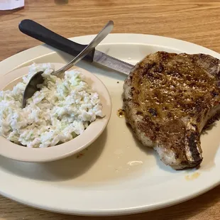 Pork chop special with cole slaw and a side salad (shown separately)