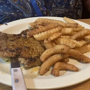 Pork chop special with well done fries (by request)