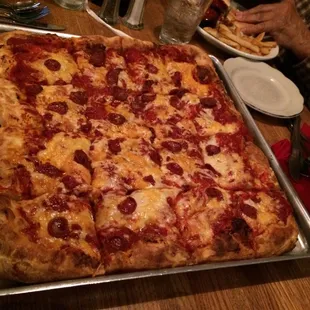 Awesome pizza with little pepperoni a