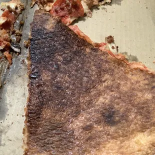 Bottom of pizza - BURNED!