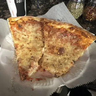 Cheese slices with a soda a lot of cheese
