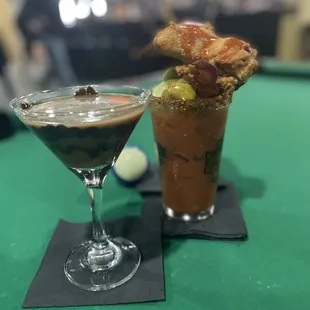 two cocktails on a table