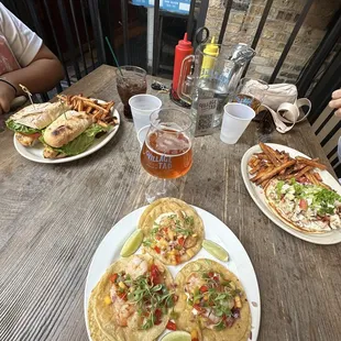 From left to right: Cajun chicken sandwich, shrimp tacos, the PITA sandwich