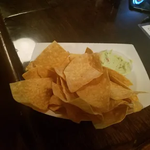 Chips and "guacamole" that i'm pretty sure isn't actually made out of avocado, still creamy and tasty