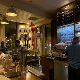 people sitting at the bar