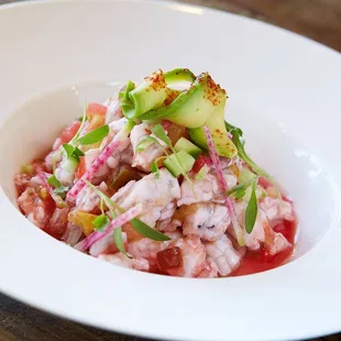 Shrimp Ceviche made with Blood Orange, Heirloom Tomatoes, Watermelon Radish, and Cilantro Microgreens