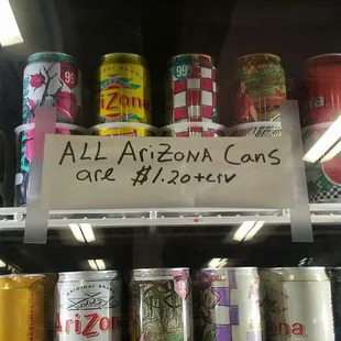 a variety of cans of soda