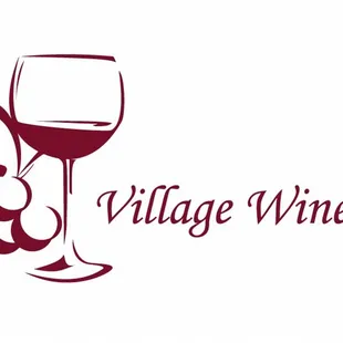 a glass of wine and grapes