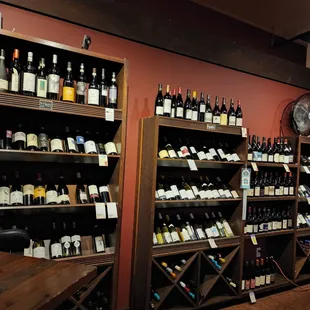 shelves of wine in a wine shop