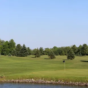 Finish your front nine with our 9th green beside water