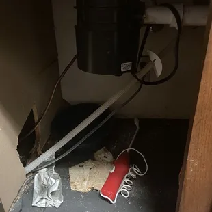 The cabinet floor was water damaged and broken