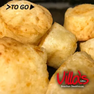 a close up of a pile of bread rolls