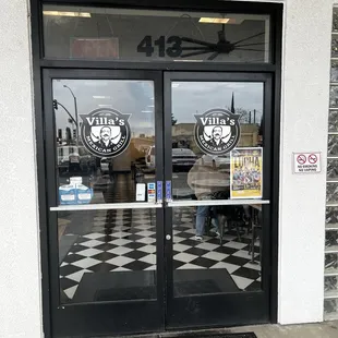 The nondescript understated front entrance