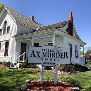 The sign and home where the axe murders took place