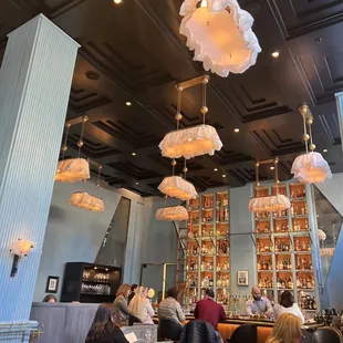 Interior dining area with bar in the background