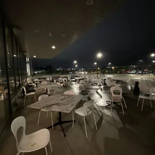 tables and chairs at an airport